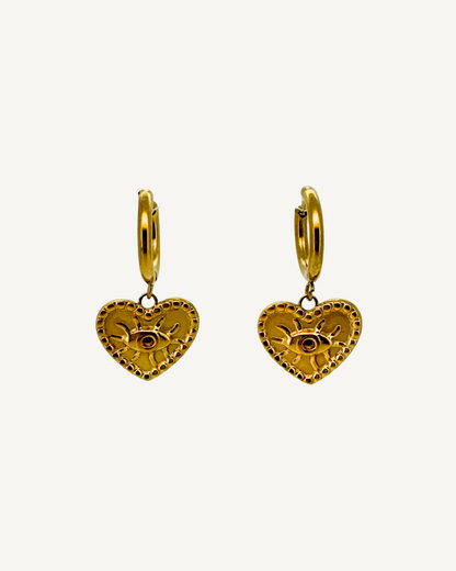 Sybil Heart Evil Eye Huggie Earrings