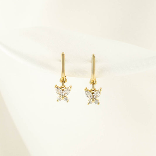 Gwendolyn White Zircon Butterfly Huggie Earrings