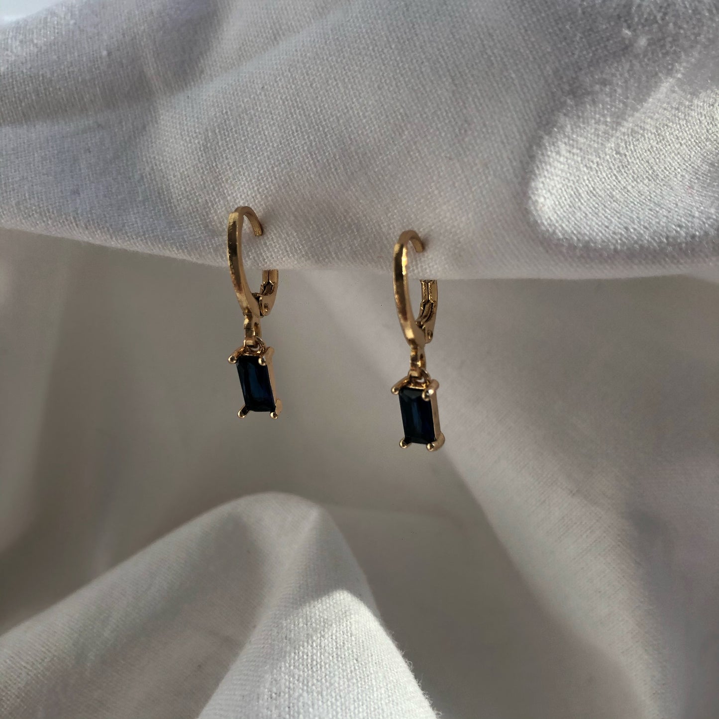 Avery Sapphire Huggie Earrings