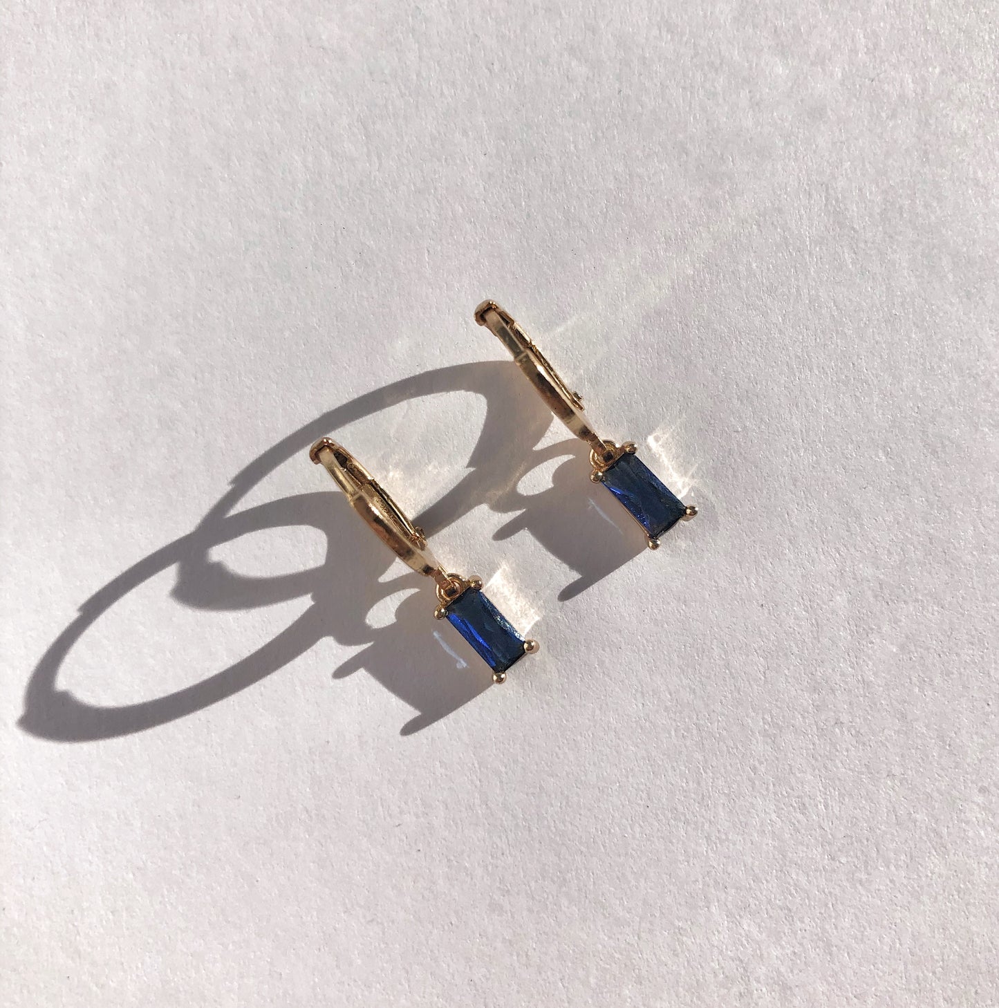 Avery Sapphire Huggie Earrings