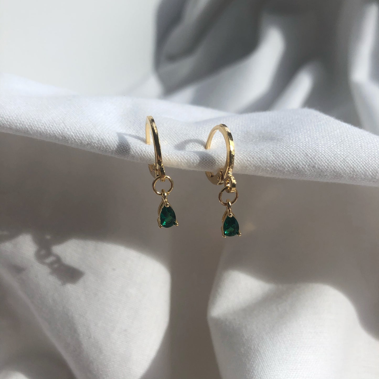 Esme Emerald Huggie Earrings