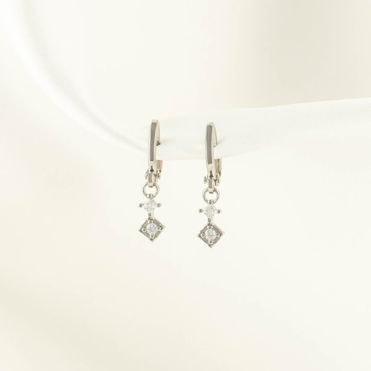Temperance White Zircon Huggie Earrings
